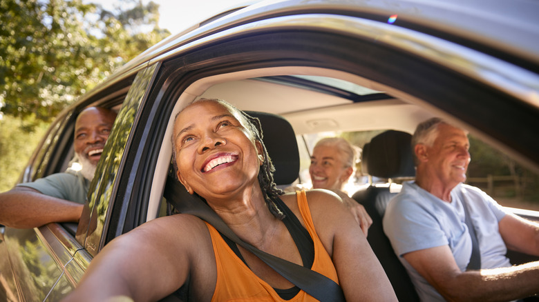 Group of people in a car.