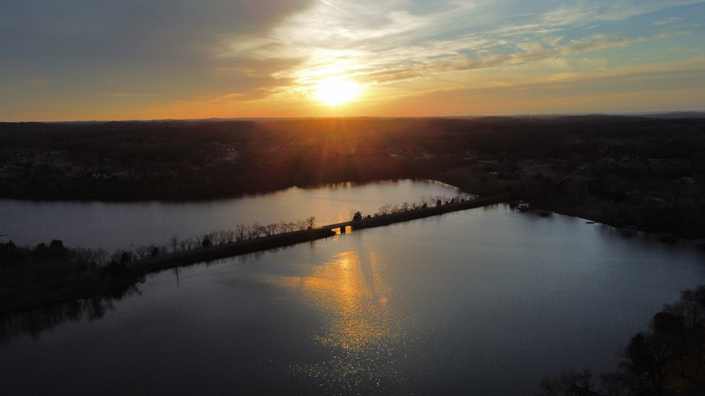 The sun setting over a lake in Gallatin, Tennessee