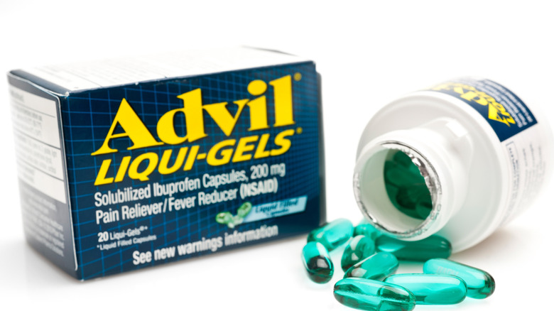Box for Advil Liqui-Gel  next to open container and pile of capsules