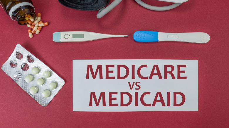 Medicare versus Medicaid text on a red background