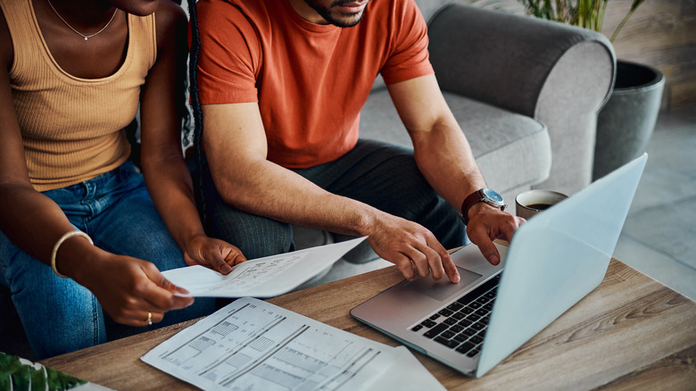 Couple looks over finances together