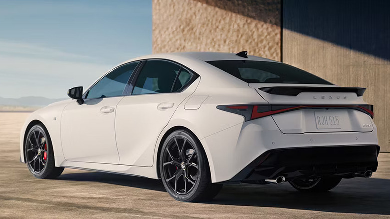 white 2026 Lexus parked near textured wall with desert in background