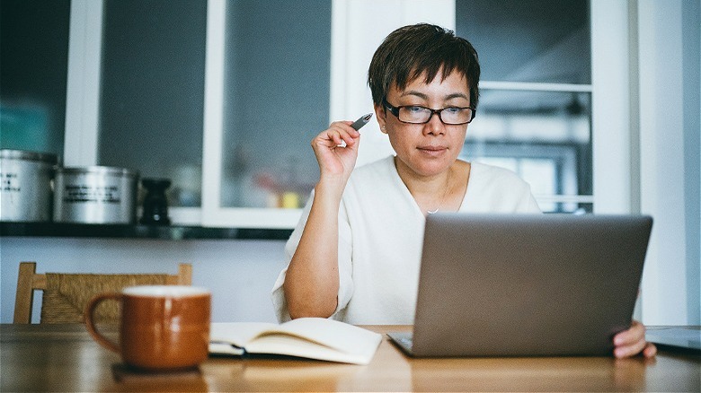 Person looking at laptop