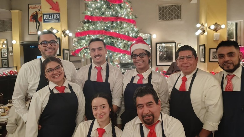 Staff at the final Christmas of the Un Deux Trois