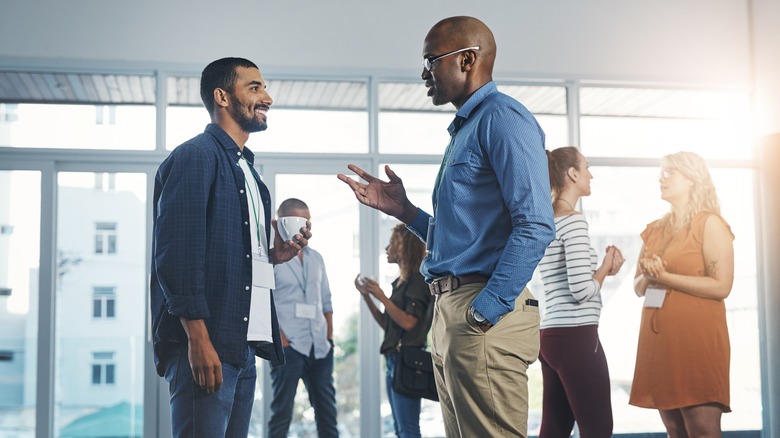 people talking in workplace