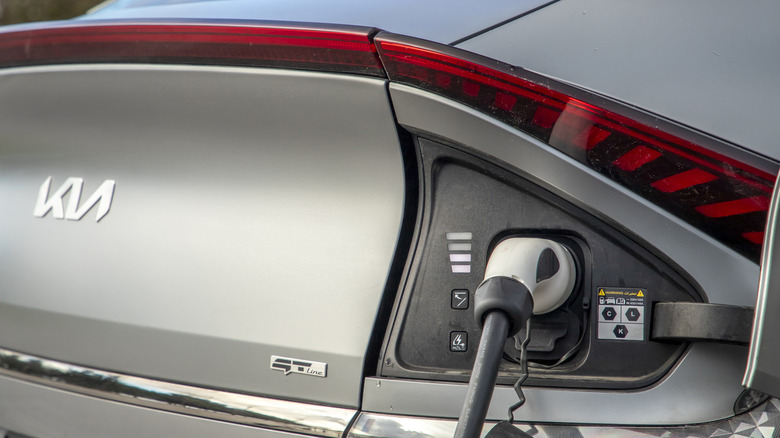 Kia EV6 plugged into a charging station
