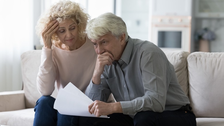Couple looking at bill