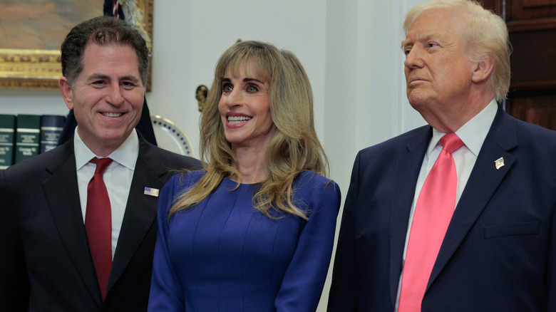L-R: Michael Bell, Susan Bell, and Donald Trump during a press release where announcement of the contribution was made.