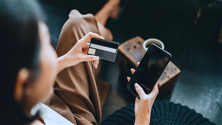 Person inputting credit card information