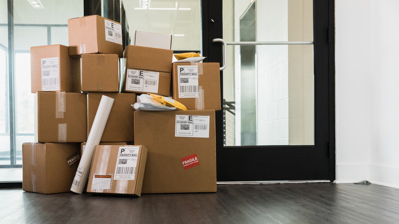A pile of online order packages being delivered