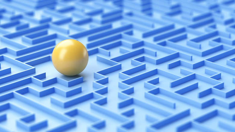 A yellow ball in a maze