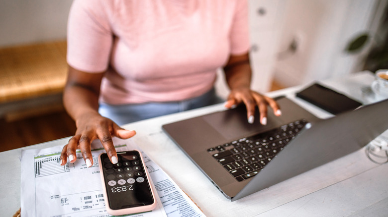 Woman calculating finances