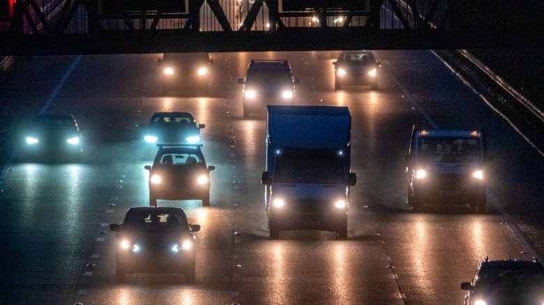 Cars on highway at night