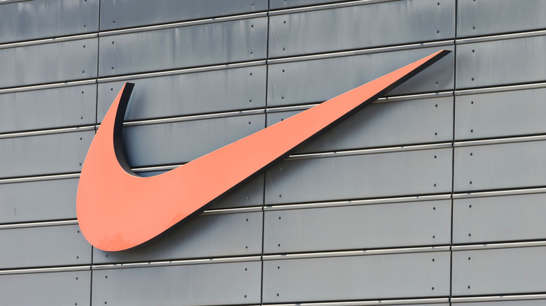 Nike brand sign and logo outside store