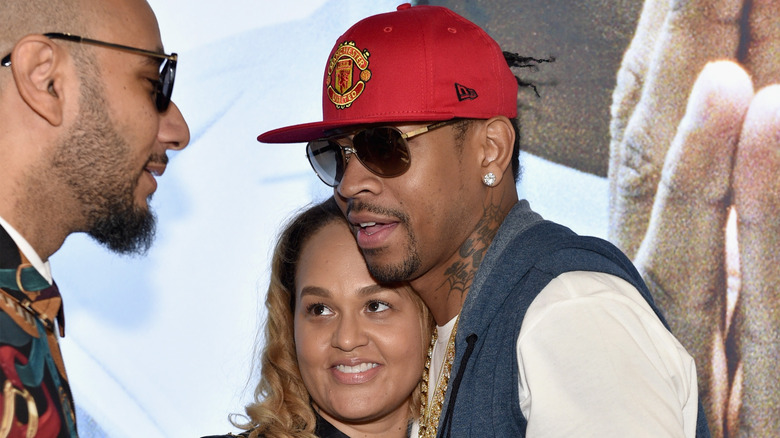 Allen and Tawanna Iverson talking to Swizz Beatz