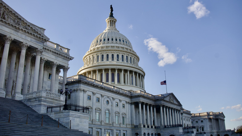 The exterior of the U.S. Capitol building on a clear day.