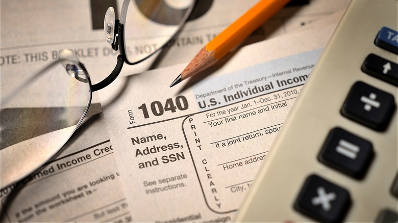 Tax paperwork and a calculator