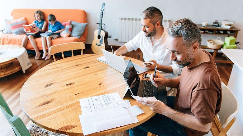 Married couple budgeting for family
