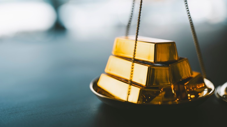 Gold with balance scale