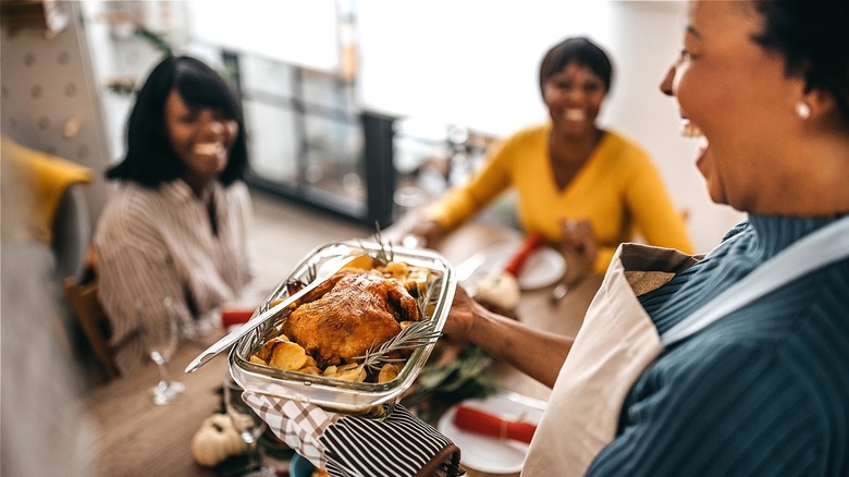 Family enjoying Thanksgiving dinner