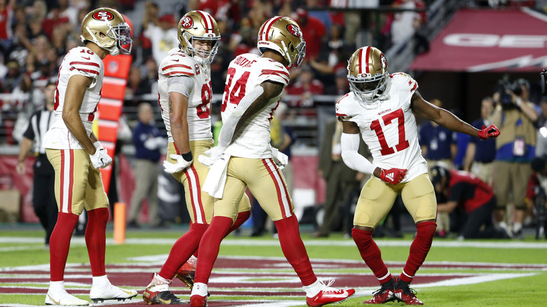 49ers players dance during touchdown
