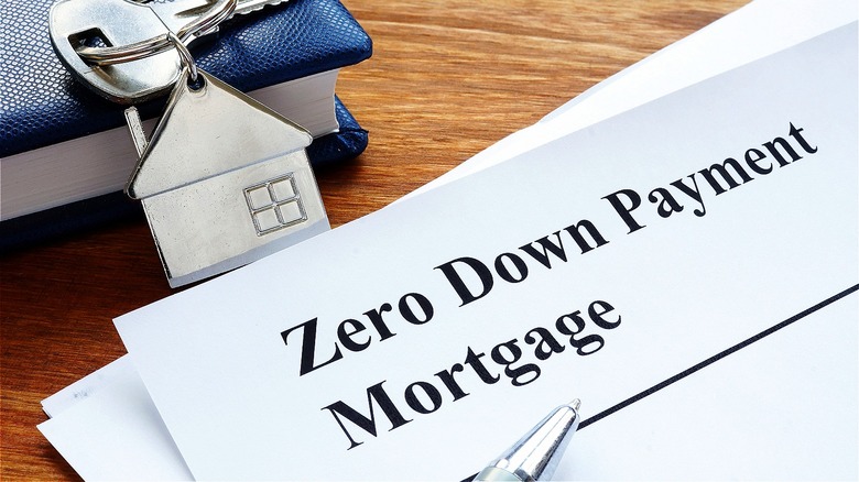 House key with mortgage papers