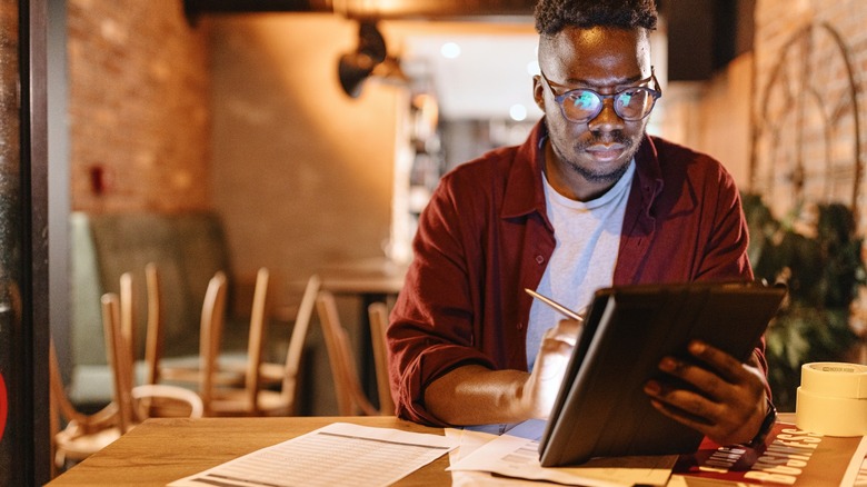 Business owner looking over numbers