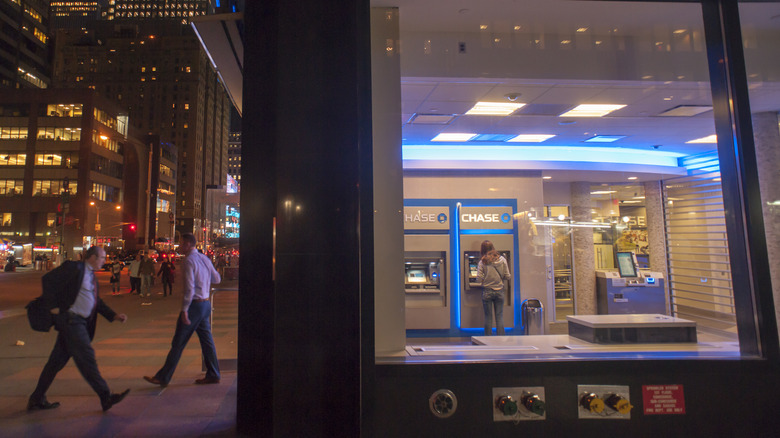 Person walking into a bank