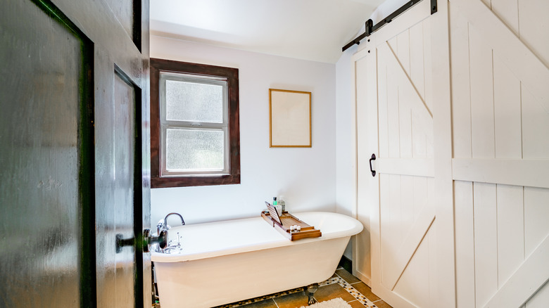 farmhouse doors in bathroom