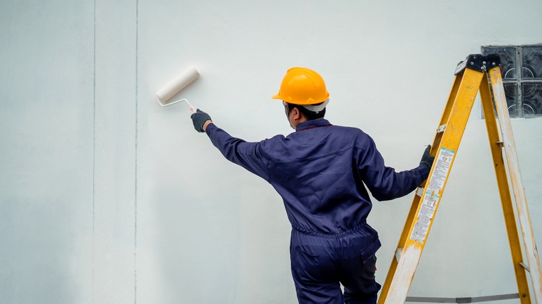 painter painting a room