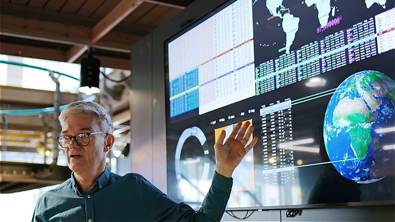 Person giving presentation with monitor