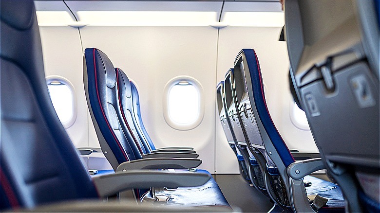 Rows of empty airplane seats