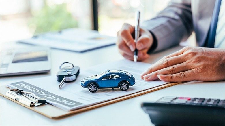 Model car with contract documents