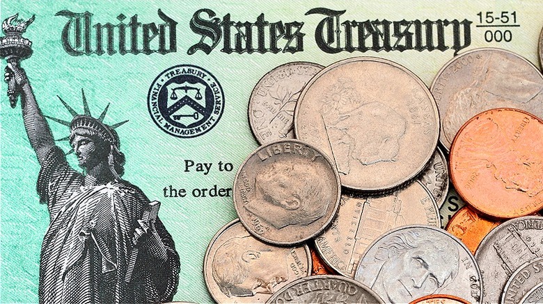 Coins scattered across tax refund