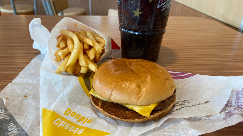 A double cheeseburger and small fry McValue Meal with a large Coke at McDonald's.