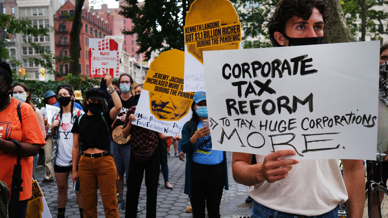 A protestor holding a sign