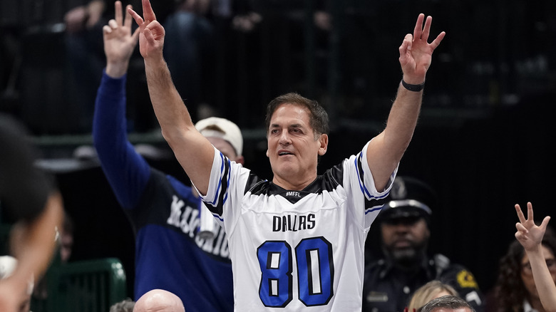 Mark Cuban wearing a Dallas jersey