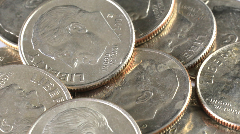 Close up view of U.S. dimes in a pile