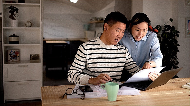 Couple looking at finances