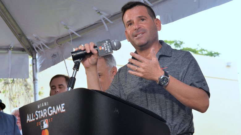 David Samson speaking into a microphone at the Miami All Star Game.