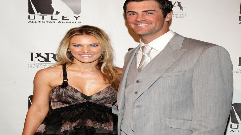 Cole and Heidi Hamels smiling for the cameras together.