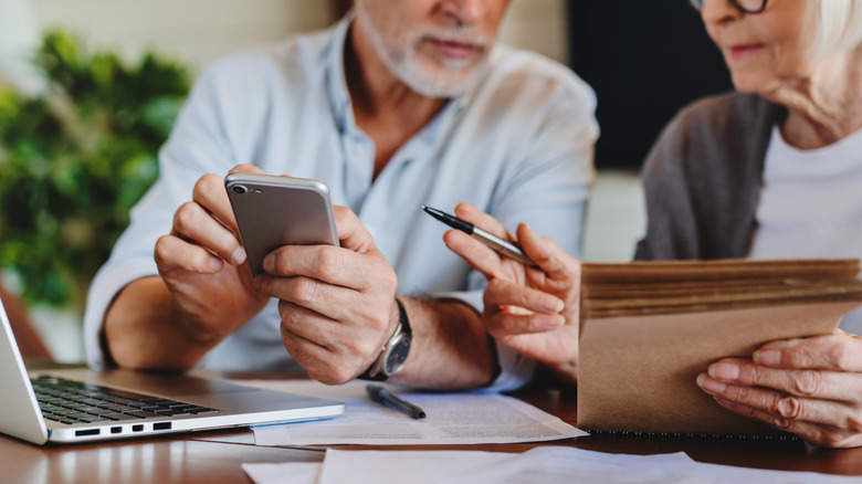 Couple managing finances.