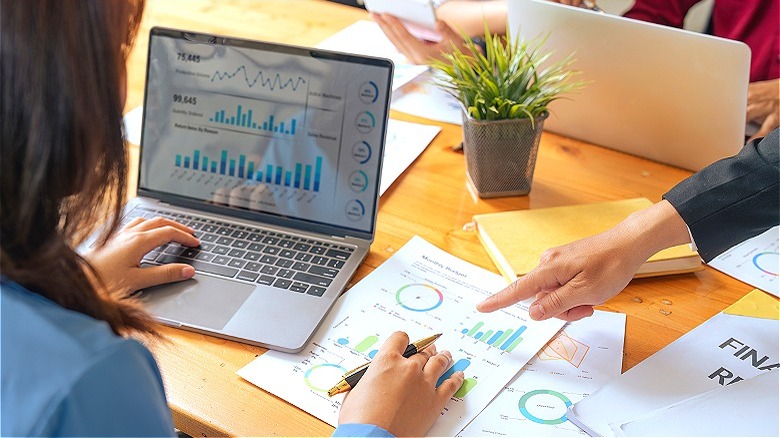 Person reviewing financial reports