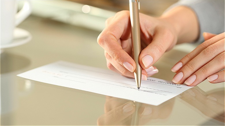 Person signing a money order
