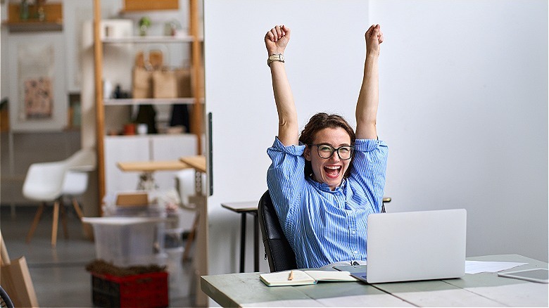 Person celebrating an achievement