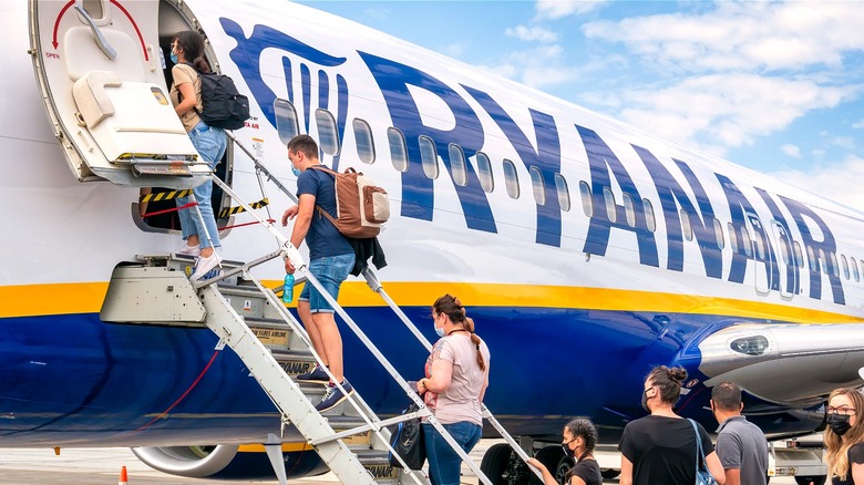 People boarding a Ryanair airplane