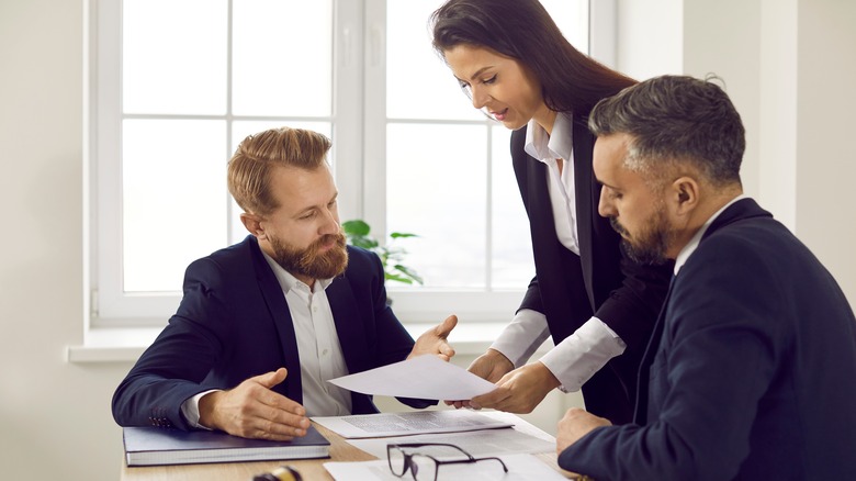 People meeting with a notary