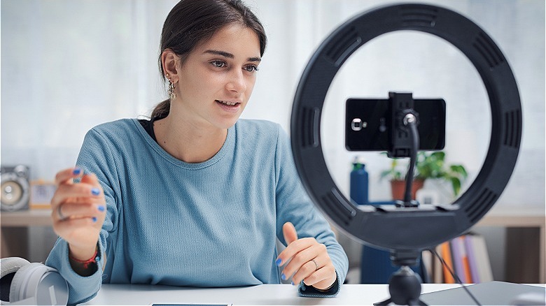 Person making a ring-light video