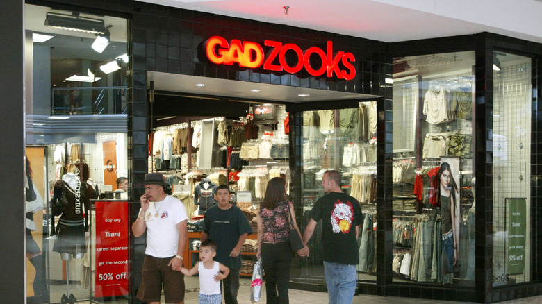 Shoppers enter and exit a Gadzooks store July 21, 2003 in Schaumburg, Illinois.