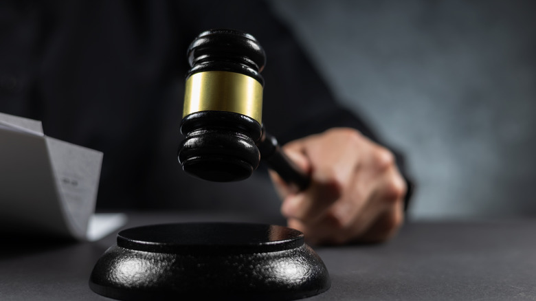 Judge slamming a wooden gavel